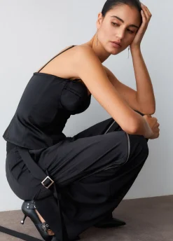 Pantaloni larghi con zip