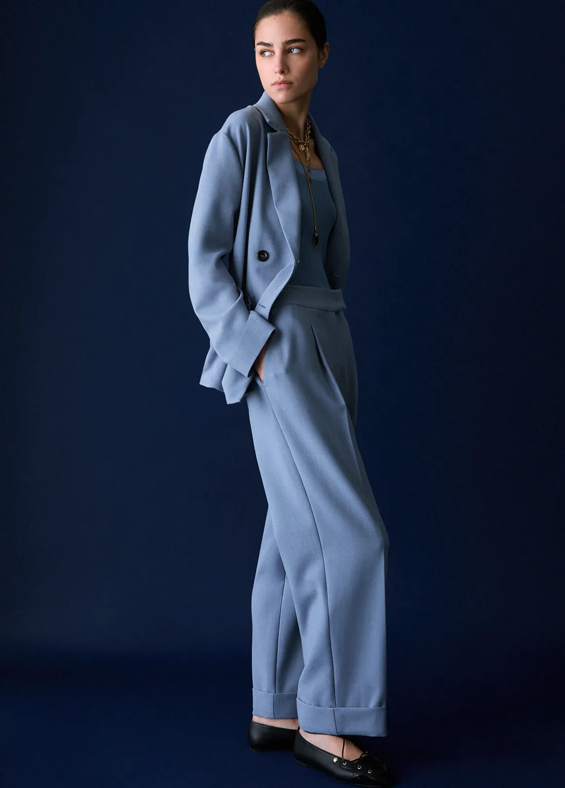 Pantaloni mélange con risvolto
