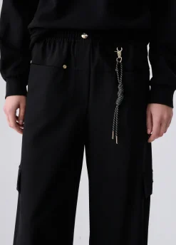 Pantaloni oversize con charm