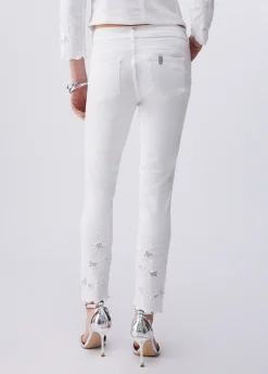Pantaloni skinny con ricamo sangallo