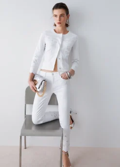 Pantaloni skinny con ricamo sangallo