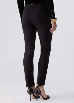 Pantaloni slim fit con applicazioni
