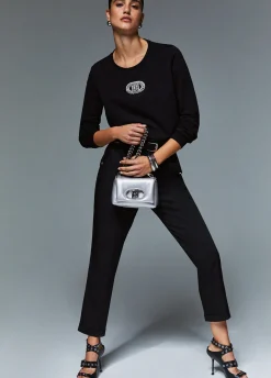 Pantaloni slim fit con risvolto