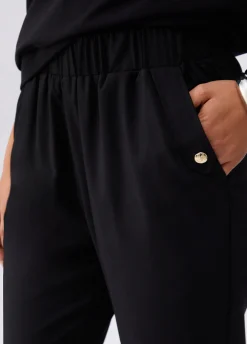 Pantaloni slim fit con risvolto