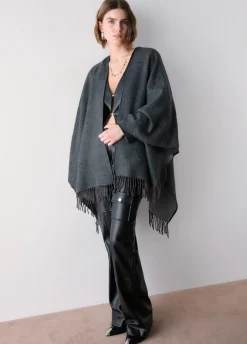 Poncho con logo embossed