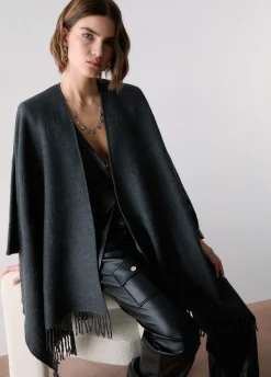 Poncho con logo embossed