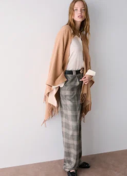 Poncho con logo embossed