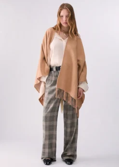 Poncho con logo embossed