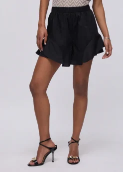 Shorts con volant