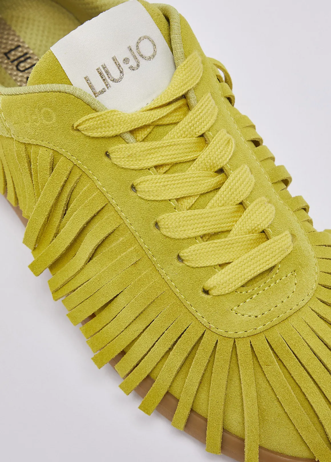 Sneakers in suede con frange