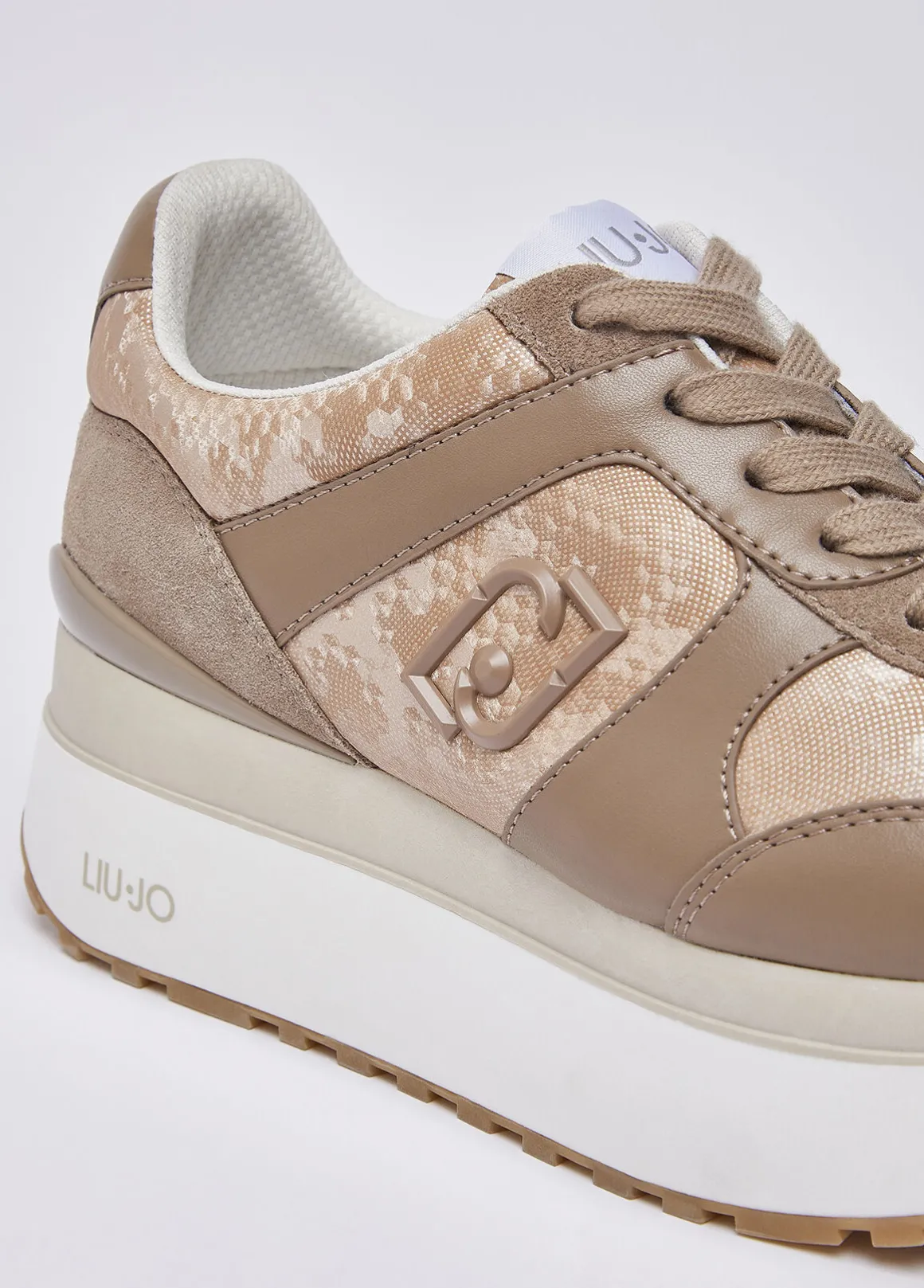 Sneakers super platform effetto pitone