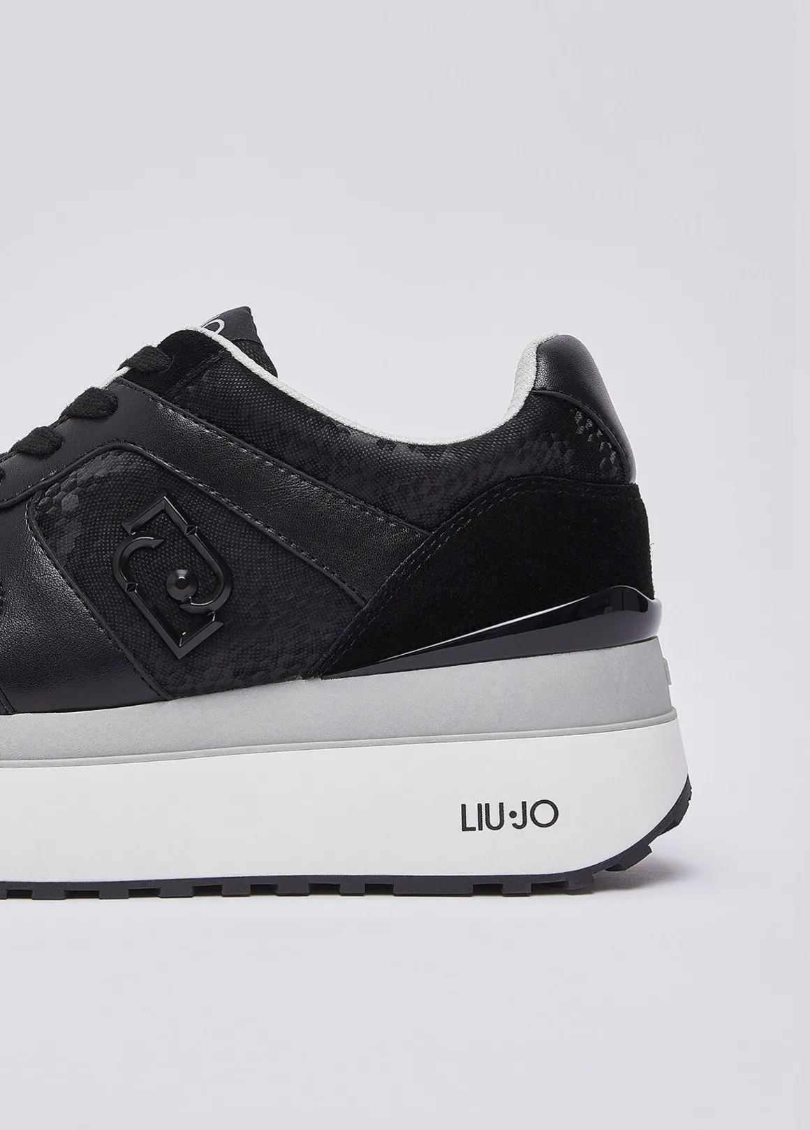 Sneakers super platform effetto pitone