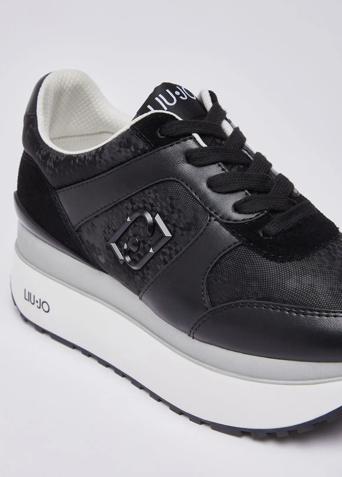 Sneakers super platform effetto pitone