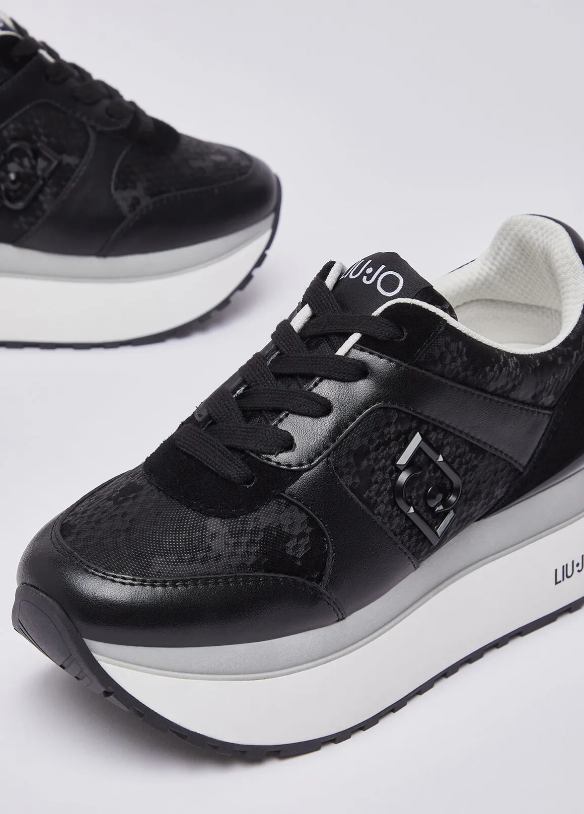 Sneakers super platform effetto pitone