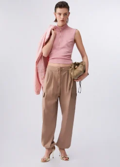 Top con mezza zip