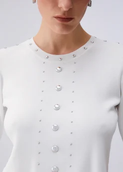 Top in maglia con borchie