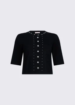 Top in maglia con borchie