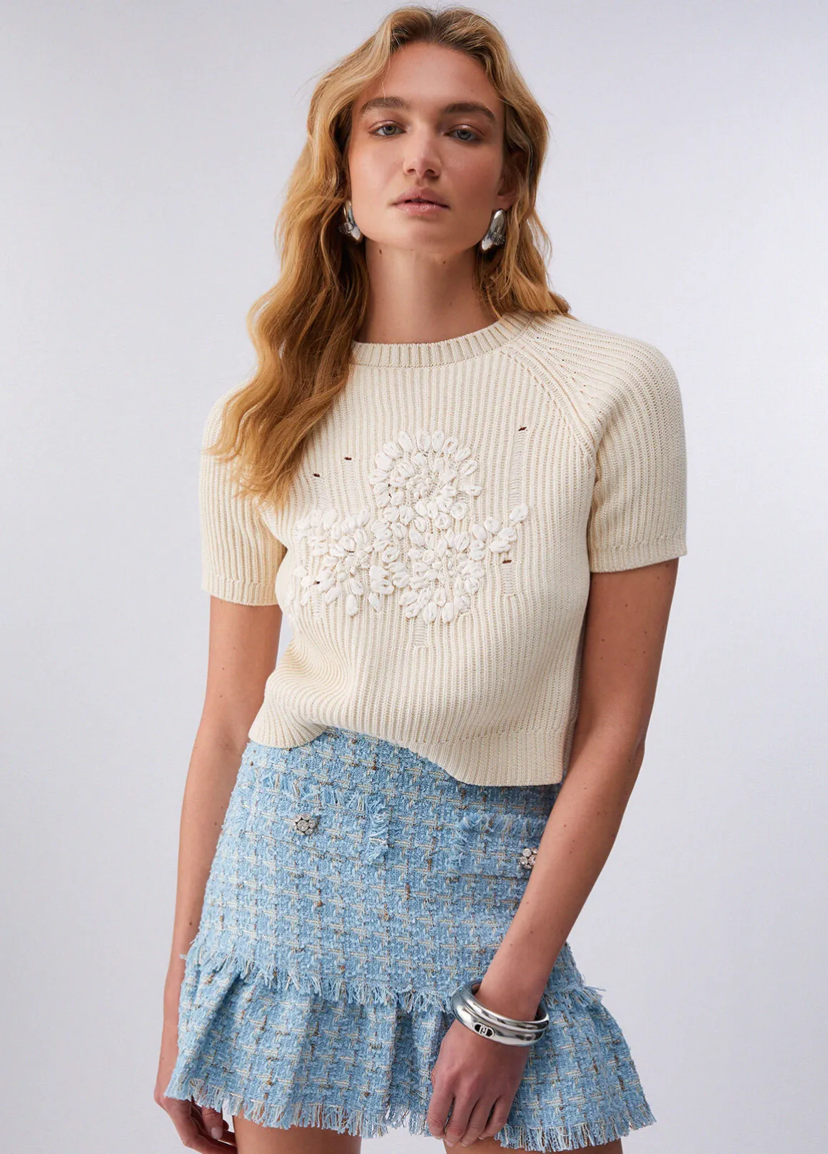 Top in maglia con ricamo in rafia