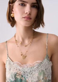 Top in raso stampato con pizzo
