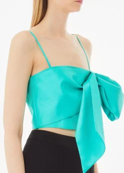 Top turchese con fiocco