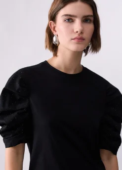 T-shirt bimateriale con maniche a sbuffo