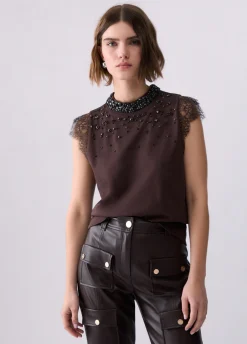 T-shirt con pizzo e strass