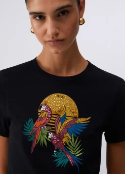 T-shirt con stampa e applicazioni